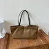 Bolsa Tote Melaleuca Camurça Feminina 2026 Nova Textura de Alta Qualidade Outono Casual Grande Capacidade Bolsa de Ombro