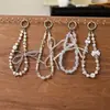 Corrente de Celular com Pérolas de Cristal e Laço Pingente Chaveiro Ornamento Pendente Estilo Girly Ins