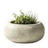 Vaso de flor de terrazzo redondo curvo especializado para cidades de turismo cultural, flexível e conveniente para decoração de paisagismo de terraços de vilas