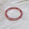 Venta al por mayor de fábrica flor de durazno infusión esmalte de color tarjeta sonajero 6 audaz estilo nacional temperamento jade artificial libro rojo pequeño explosiones amigas