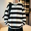 Camiseta de manga larga a rayas para otoño e invierno, cuello redondo para hombre, corte holgado, moderna, casual, versátil, top unisex, marca de moda