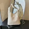Bolsa Tote Feminina Versátil de Grande Capacidade Transfronteiriça Nova Tendência Moda Casual Nicho Bolsa de Ombro Transversal Primavera 2026