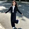 Traje preppy para niñas 2026 nuevo traje de otoño de moda con pantalones de pierna ancha para niñas de secundaria conjunto casual de dos piezas