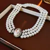 Pulseira de Pérolas Multicamadas Oval com Diamante Corrente para Clavícula com Temperamento Retrô de Luxo Leve Francês Conjunto de Colares de Alta Qualidade para Mulheres