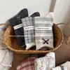 Songmu Outono/Inverno Novo Estilo Designer "Meias de Cano Médio Menina Laço Meias de Algodão Florais Meias Largas Estilo Coreano"