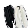 Pantalones casuales nuevos de primavera y otoño para hombre, nuevos estudiantes, holgados, talla grande, pantalones deportivos, atmosféricos, moda, al por mayor