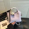 Bolso de mano casual simple de nicho estilo coreano, bolso tote pequeño para mujer, nuevo bolso de moda 2026 para ir al trabajo, al hombro y cruzado