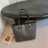 Bolso de axila retro de gran capacidad transfronterizo para mujer, nuevo bolso de hombro simple de moda 2026, bolso tote para el trabajo y los desplazamientos