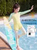 Traje de baño para niñas mayores con copas 2026 Nuevo modelo Traje de baño de manga larga con protección solar para adolescentes