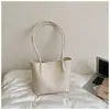 Bolsa casual estilosa de grande capacidade 2026 novo modelo bolsa de ombro casual bolsa de axila padrão trançado bolsa sacola para o dia a dia