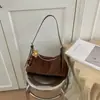 Bolsa de Mão Feminina Suede Pelúcia Estilo Retro Coreano de Nicho Transfronteiriça Nova 2026 Bolsa de Ombro Único Transversal para o Dia a Dia