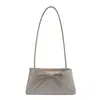 Bolso de Hombro Suave PU Color Sólido Dulce y Artístico 2026 Verano Lazo Bolso de Axila Estilo Ballet Bolso de Mano Simple de Moda