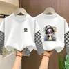 Camiseta de manga larga de algodón puro para niña para primavera y otoño, camiseta base de retazos a rayas para niñas mayores, top elegante y versátil de cuello redondo