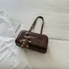 Bolso de Hombro Retro de Color Sólido de Nicho 2026 Otoño Nuevo Llegada Gran Capacidad de Nicho Alta Apariencia Personalidad Moderno