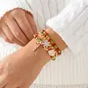 Conjunto de Pulseras con Atmósfera Navideña Transfronteriza Europea y Americana Papá Noel Copo de Nieve Bastón de Caramelo Combinación de Cuentas de Colores Festival Qixi