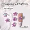 Nuevas Decoraciones de Arte de Uñas de Aleación con Flores de Perlas de Colores Flores de Cinco Pétalos de Dopamina Gotas de Agua Decoraciones para Uñas DIY