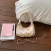 Bolsa Plissada Bordada de Nicho Estilo Chinês Tendência Nova para Mulheres, Nova Bolsa de Ombro Transversal Estilo Chinês para o Verão 2025