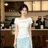 Vestido coreano de línea A con cola de pez para mujer, nueva colección de verano, conjunto de camiseta asimétrica sin hombros con estampado floral y falda