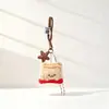 Colgante de peluche de hamburguesa chirriante, oso de mantequilla, caricatura, lindo, femenino, charm para bolso, llavero para mujer