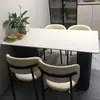 Mesa de jantar preta simples com superfície de rocha sinterizada fosca, adequada para apartamentos pequenos, mesa de jantar e cadeiras de luxo leve para casa