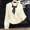 Outono Inverno 2026 Novo Cardigã de Tricô com Gola Redonda e Laço para Mulheres Design Versátil e Moderno Cardigã de Tricô com Manga Longa