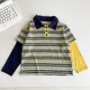 Valle del Viento 2026 Otoño Nuevo Estilo Coreano Bloque de Color Niños Dos Piezas Falsas Camisa POLO Primavera/Otoño Niños Cuello Solapa Top
