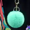 Al por mayor en stock Bola de pelo de imitación de conejo Rex de 8 cm llavero colgante lindo para mujer bolso de coche teléfono móvil colgante de felpa