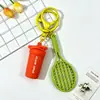 Botella de Agua Deportiva Fitness Linda y Creativa Llavero Colgante Raqueta de Tenis Dopamina Llavero para Mochila de Hombres y Mujeres Regalo