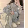 Chaqueta de camisa casual a rayas estilo francés para mujer, nuevo modelo principios de otoño 2026, top de manga larga de verano con protección solar
