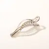 Pinza para el pelo de pico de pato de leopardo de alta gama exclusiva transfronteriza, elegante y versátil, Pinza para el pelo de pico de pato con forma de lazo, Accesorio para el pelo para la parte posterior de la cabeza