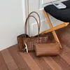 Bolso de Mano Tejido Hueco para Mujer 2026 Nuevo Otoño Gran Capacidad Lujo Ligero Nicho Moda Casual Bolso de Hombro