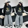 Conjunto de dos piezas estilo caricatura para niñas Zhongda primavera y otoño 2026, sudadera de otoño para niños, capa base moderna para la vuelta al cole