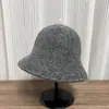 Sombrero de pescador de punto de color liso estilo coreano para mujer, estilo japonés, simple y cálido para otoño e invierno, hace que la cara se vea más pequeña, sombrero tipo cubo de moda de doble cara