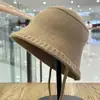 Estilo Nuevo Primavera y Verano Sombrero de Pescador Hueco Tejido para Mujer Japonés Casual Versátil Moda Sombrero Cubo para Sombrear y Proteger del Sol