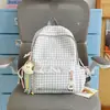 Mochila Fresca Estilo Coreano com Estampa Xadrez e Bolinhas com Acabamento em Renda, Pequena Mochila Escolar para Meninas, Adequada para Alunos do Ensino Fundamental II e Médio, Bolsa para Mulheres que se Deslocam
