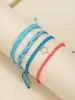 Pulseira Wave em estilo boêmio, com estampa de ondas e tecido encerado, em promoção na Amazon Cross Border.