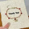 Pulsera Roja para el Año del Caballo, Doble Capa con Monedas de Cobre y Amuletos de Caballitos, para Mujer, Lujo Ligero, de Nicho, Exquisita, Regalo de Alta Gama