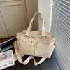 Bolsa de lona de grande capacidade para mulheres, nova coleção de verão 2025, bolsa transversal de ombro única de nicho, bolsa tote plissada estilo coreano para escola