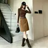 Falda midi de mujer del sudeste asiático transfronteriza, nueva de cintura alta, elegante, versátil, adelgazante, falda lápiz de una pieza