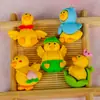 Pato amarillo pequeño accesorios para joyería diy al por mayor estuche de papelería funda para teléfono accesorios para el cabello pasador accesorios para refrigerador