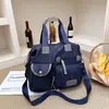 Bolsa feminina transfronteiriça de grande capacidade 2026 Europeia e Americana, bolsa de maternidade, bolsa de ombro em tecido Oxford, bolsa de mão, bolsa de viagem, bolsa transversal