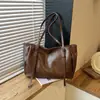 Bolso de nicho de lujo ligero de alta gama, bolso Maillard para mujer, nuevo bolso de hombro único de otoño 2026, bolsa de mano de gran capacidad para el trabajo