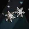 Brincos de floco de neve rotativos com design original, liga de cobre com banho de ouro real, microincrustados com zircônio, pino de prata s925, brincos de alta qualidade