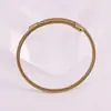 Fabricantes europeus e americanos de pulseiras espirais retráteis de aço inoxidável fornecem pulseira banhada a ouro pulseira atacado transfronteiriço