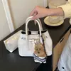 Bolso Cubo de Mano de Alta Gama Estilo Coreano Transfronterizo para Mujer 2026 Nueva Moda Versátil Textura de Alta Calidad Bolso de Hombro Cruzado