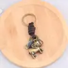 Llavero creativo para hombres y mujeres, pequeño regalo, aleación, lindo animal de aleación, llavero de cuero tejido vintage, llavero