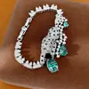 Collar de leopardo pequeño bañado en oro real con incrustaciones de circonita, cadena para la clavícula de nicho de lujo ligero, juego de exquisitas joyas vintage estilo palacio