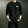 Camiseta blanca de manga larga para hombre, nuevo estilo otoño/invierno 2026, corte holgado, capa base, ropa interior, top casual para adolescentes