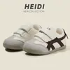 Zapatos Forrest Gump para Niños Primavera y Otoño 2026 Zapatos Deportivos para Niños Tenis Casuales Zapatos Blancos para Niñas Zapatos de Entrenamiento Alemanes para Bebés con Suela Suave