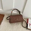 2026 Otoño Temprano Nuevo Exquisito Simple Moda Patrón Tejido Versátil Bolso de Hombro para Viajes Cotidianos Bolso Cruzado Venta al por Mayor Bolso de Mujer
